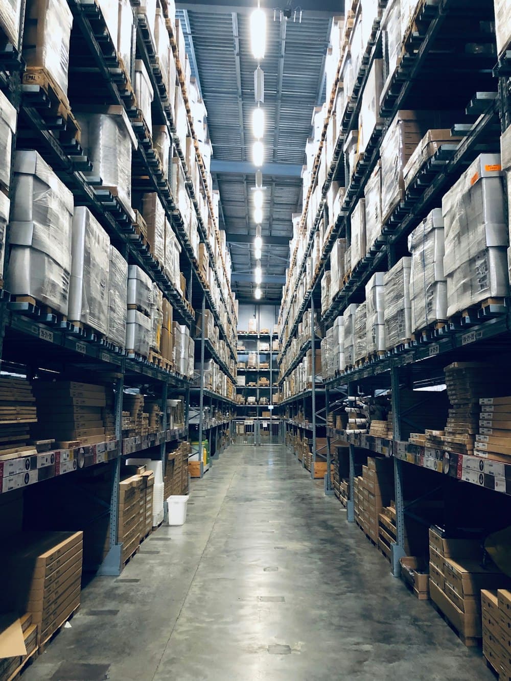 Warehouse aisles stocked with building products